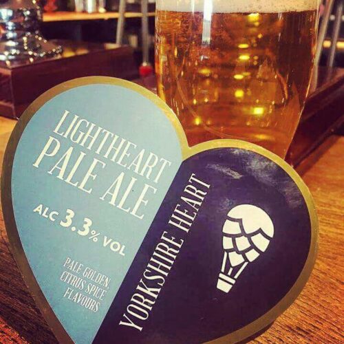 Lightheart Pale Ale pint glass and heart coaster